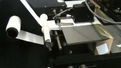 Auto Labe tamp down top labeler 561 280