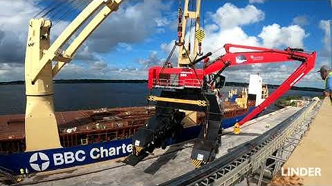 Unloading a Mantsinen 300 - Largest Hydraulic Material Handler in the World for Keystone Terminals