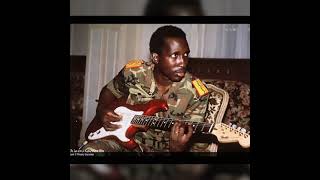 Slain Burkinabe revolutionary Thomas Sankara with guitar.