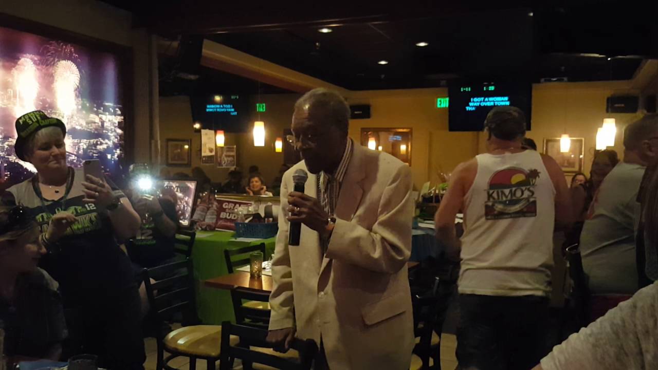 Johnny Barnes from The Platters sings "I've got a woman" at a karaoke