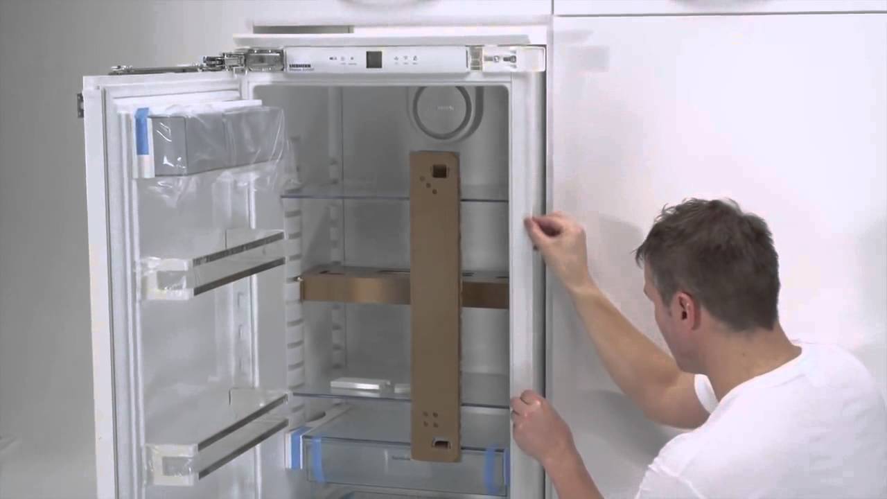 Видео-инструкция: как перевесить дверь холодильника самостоятельно