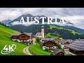 Austria 4K Alpine Views Wooden Chalets And Golden Light Over Snow Capped Peaks 