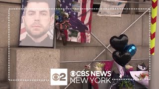 Memorial to slain NYPD Officer Jonathan Diller grows outside 101st Precinct