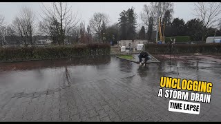 0532  Time Lapse  Unclogging A Storm Drain During Rain In Germany