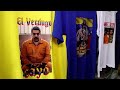 Венесуэльские мигранты в Перу продают футболки с изображением задержанного президента Мадуро