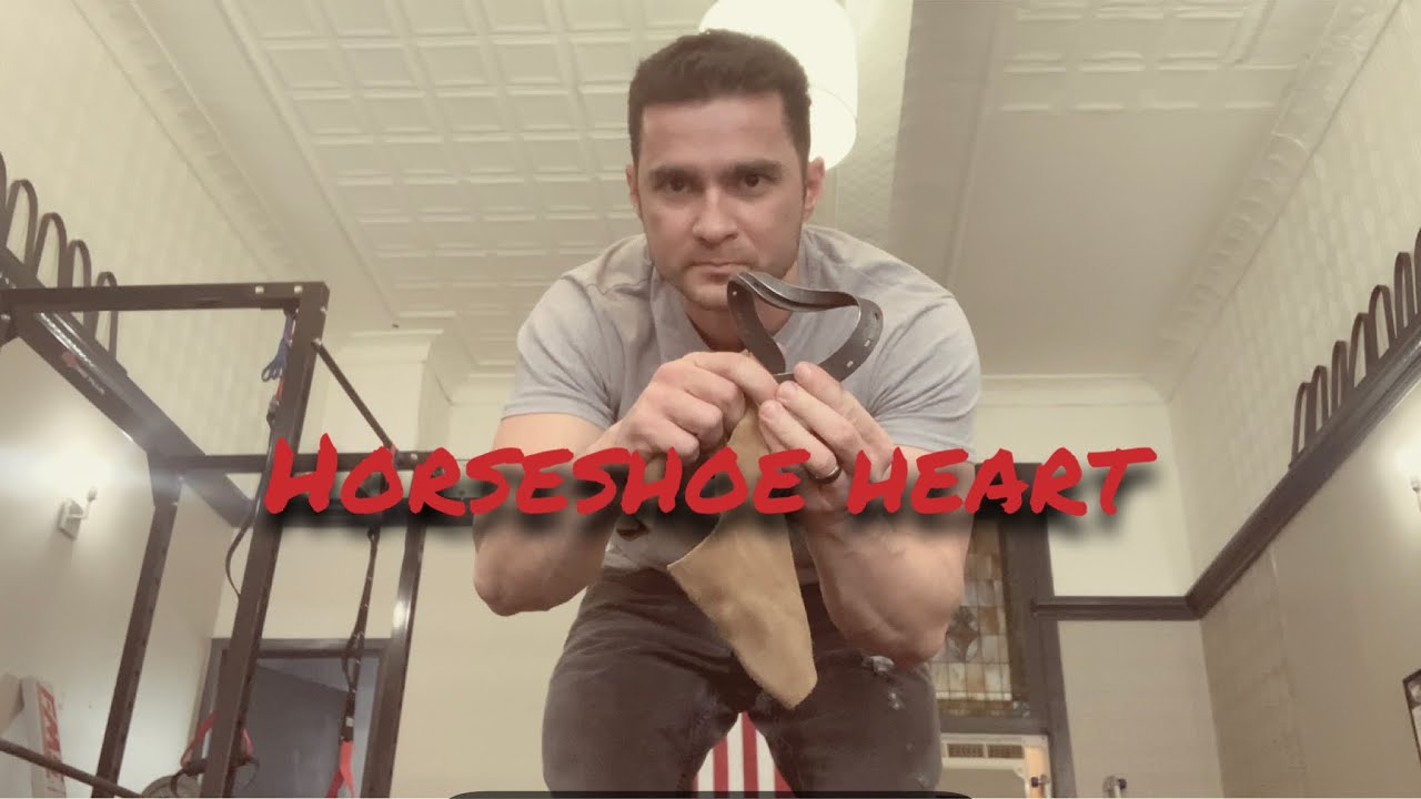 Bending a horseshoe into a heart feats of strength friday