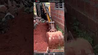 Excavator mini DIGS deep narrow trench
