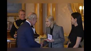 BLACKPINK receive MBE honours from King Charles III at Buckingham Palace.