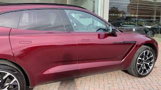 2021/70 DBX finished in Liquid Crimson with Obsidian Black interior