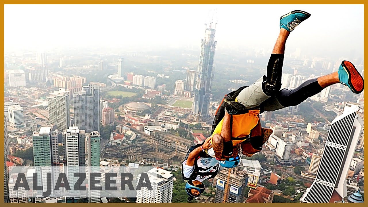 aljazeera english logo BASE jumpers from 25 countries converge in Malaysia