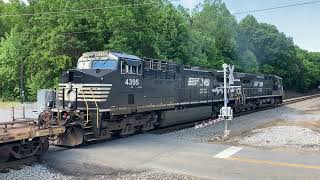 Amtrak meets NS at crossing.