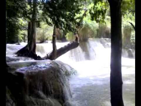 Fiona and melissa jumping into the huang si waterf...