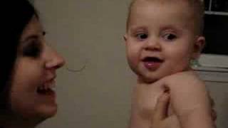 blowing in baby's face