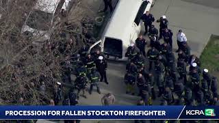 LiveCopter 3 is over a procession for the Stockton firefighter killed in a shooting while respond…