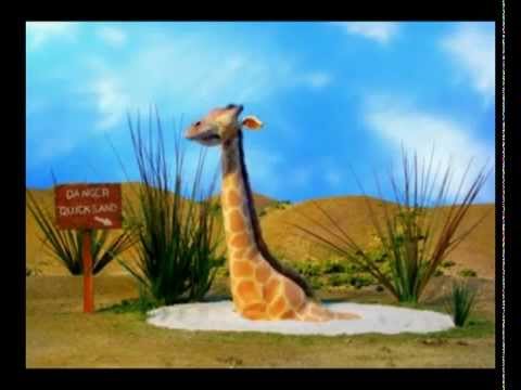 Мультфильм жираф в зыбучих песках