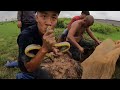 The brave group of hunters caught the ferocious dragon snake with their bare hands