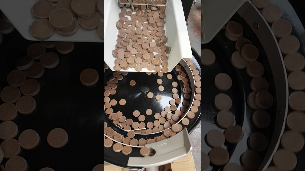 VIBRATORY BOWL FEEDING - Wad Feeding System