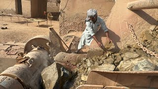Massive Rock Crushing Machine in Action”“Heavy Duty Stone Crusher Working”“Breaking Giant Rocks with