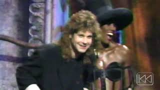 Ozzy Osbourne & Grace Jones- Presenting Eric Clapton International Rock Award for MVP Guitarist Resimi