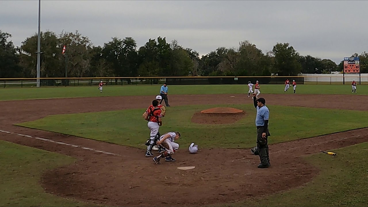 Ethan Playing Center Field Throws Out Runner at Home to End Inning