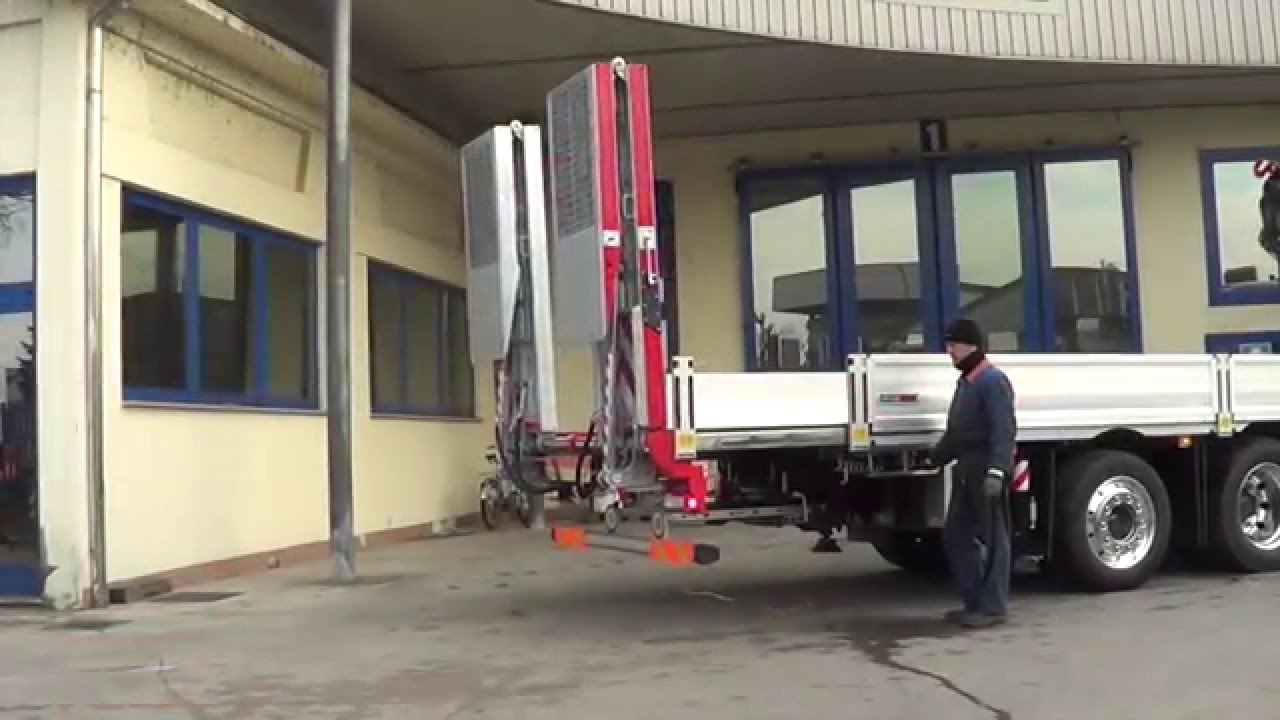 Volvo 3 assi -  Pianale ribassato allungabile con rampe e gru Fassi