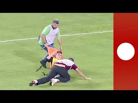 Worst medics ever Injured footballer dropped several times Greece