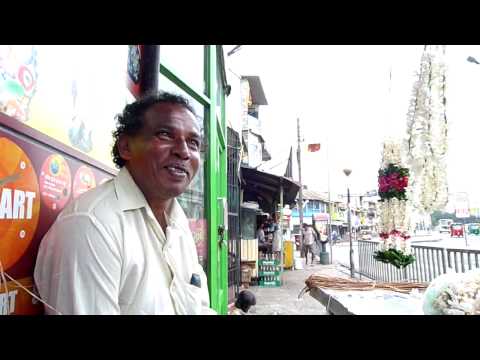 Garland Seller Then we went round the corner to Kotahena and caught some bit tipsy guys getting out of a bar and having a chat on the street. They were quite...