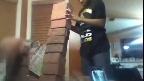 Kid breaks glass table with bricks
