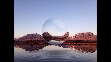 Surreal Glass Sphere Floating Within a Landscape