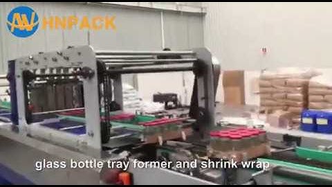 Hennopack glass bottle tray former with shrink wrapping machine