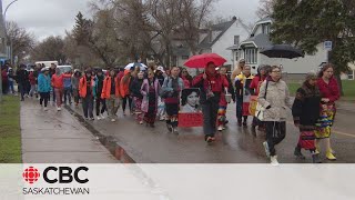 Hundreds honour MMIWG with Red Dress Day march in Regina