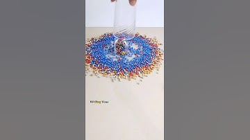 Colourful Pearls Drop from 2 Tier Glasses. #asmr #satisfying #oddlysatisfying #shorts #reverse