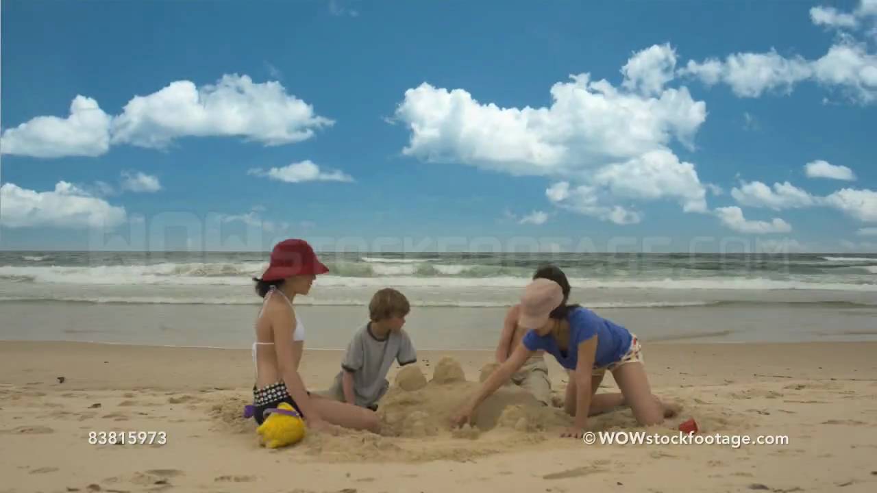 Time Lapse Of Four Children Building Sand Castle On Beach Byron Bay You Premium