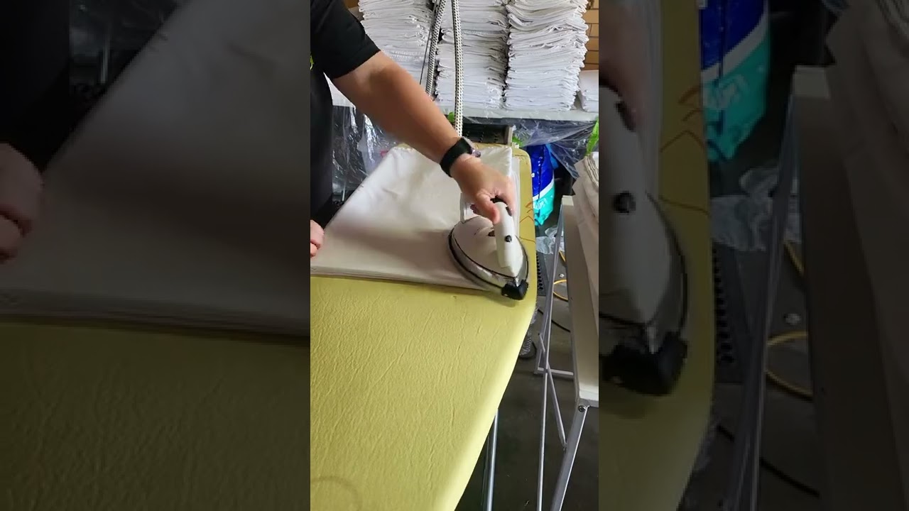 Ironing a queen sheet