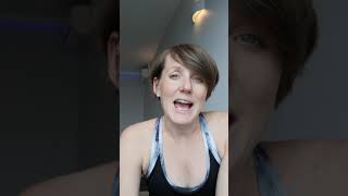 Standing wall roll down - spine & back stretch in pregnancy & postnatal pilates