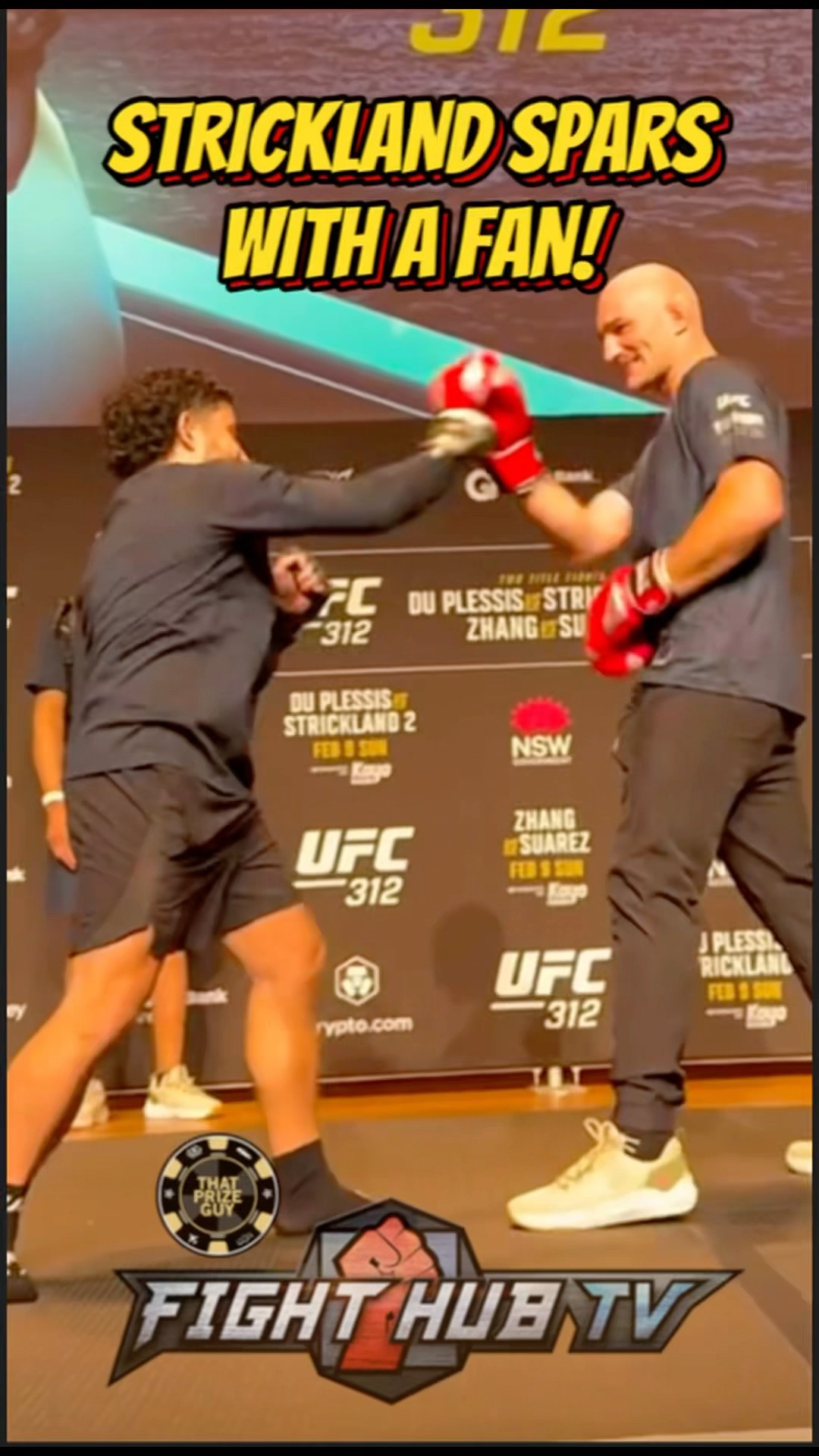 Sean Strickland SPARS with random fan at media day!