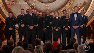 Los Angeles firefighters receive standing ovation during Oscars