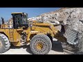 Caterpillar 992k wheel loader loading caterpillar 777f dumpers  interkat sa