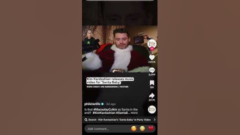 Thumbnail of Kim Kardashians Santa baby with Macaulay Culkin