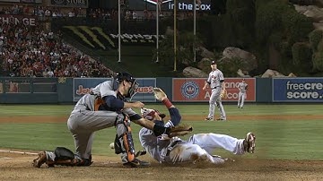 HOU@LAA: Trout beats the throw home to tie the game