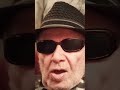 "A STRANGE MAN WALKS IN HOLDING HIS GUN AND HE IS ON THE RUN," BY BUDDY BROWN &amp; THE SINGING BOOMER..