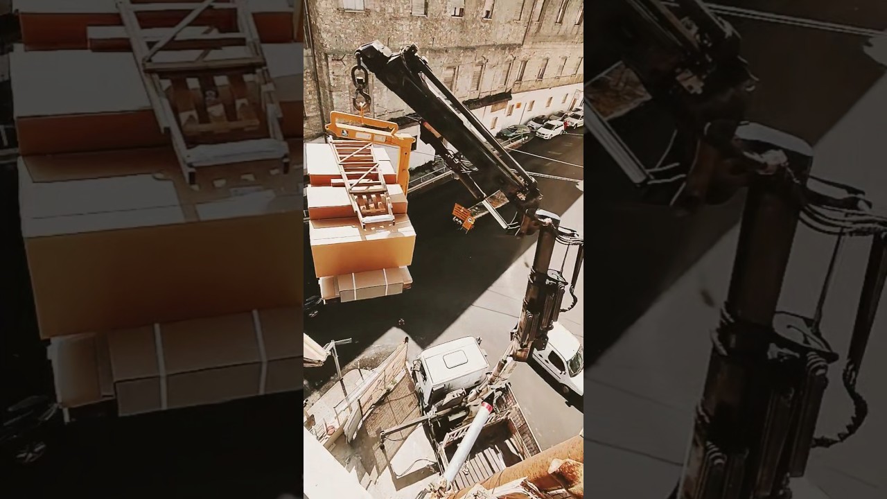 Consegna mobili al piano con Camion Gru