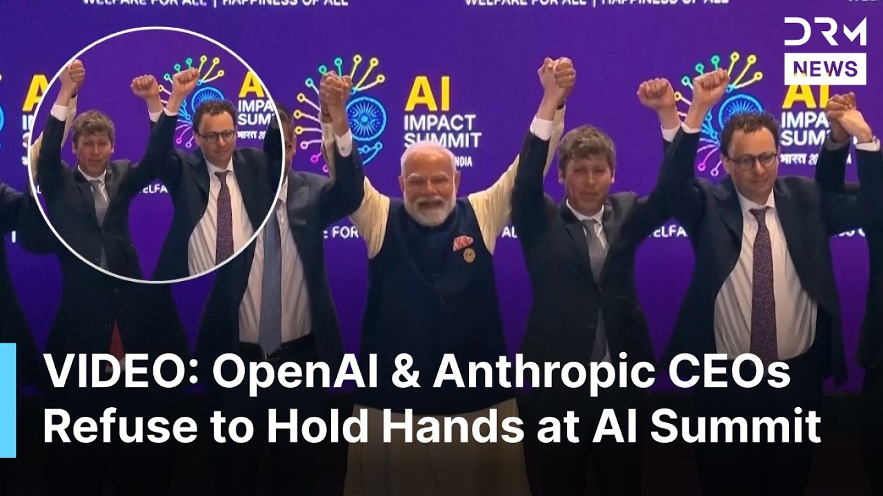 AWKWARD MOMENT: OpenAI and Anthropic CEOs Refuse to Hold Hands at India AI Summit | AQ1B