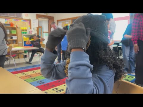 Hat and glove giveaway at Delaware Primary School