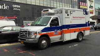 NEW YORK PRESBYTERIAN HOSPITAL EMS AMBULANCE RESPONDING ON MAIN STREET IN FLUSHING, QUEENS, NYC.