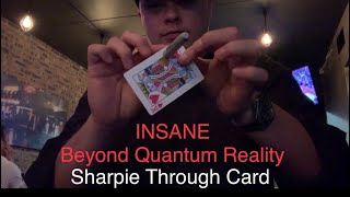 Sharpie through card: Beyond Quantum reality