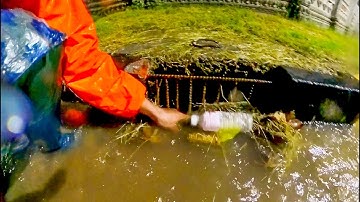 Unclogged Culvert Drain - Remove Debris And Plastic Clogged Culvert Drain Flood Water At Night