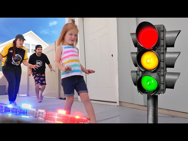 DONT GET CAUGHT by Cops!! Adley reviews Red Light Green Light toy with family! class=