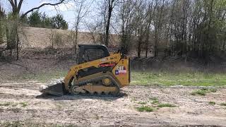 Cat 259 Skid Steer working