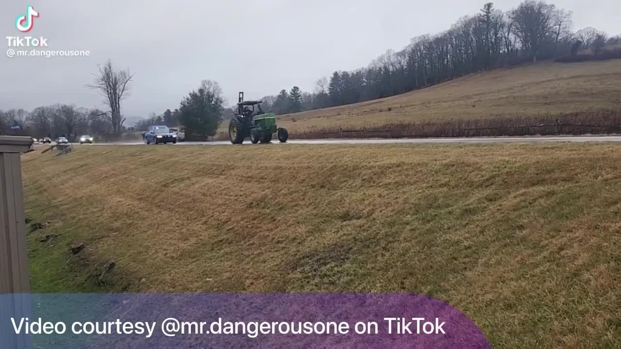Man on a tractor leads police on 20 mph chase through Boone - YouTube